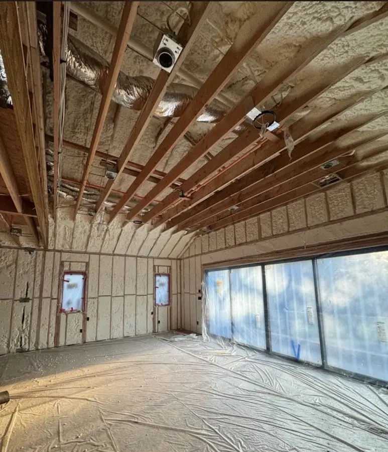 Interior walls and ceiling insulated with spray foam during new construction in Talent